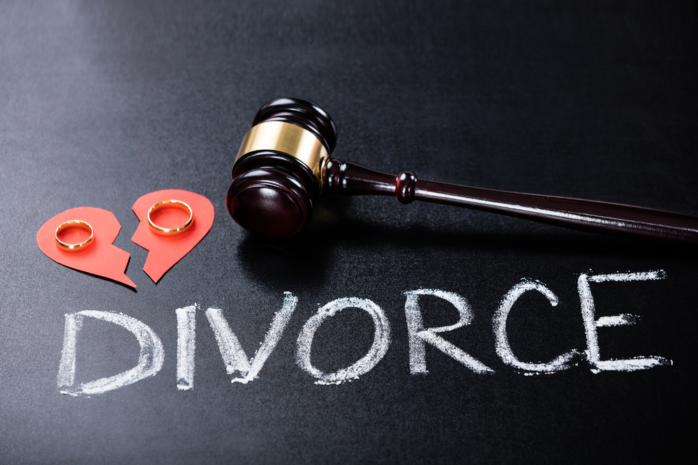 Close-up,Of,Divorce,Concept,With,Wedding,Ring,And,Gavel